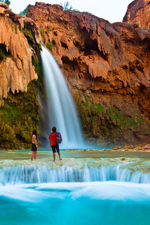 Open image in slideshow, KC Deane and Hannah Whitney hiking in the Havasupai Canyon, AZ
