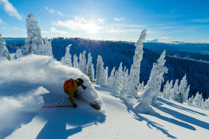 Open image in slideshow, Dane Tudor skiing at Whitefish Mountain Resort
