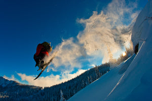 Zack Giffin skiing powder ar Red Mountain BC