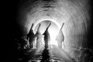 KC Deane, Adam Ü, Carston Oliver, and Johnny Collinson walking through a tunnel at Myoko Akakura Ski Area/Tsubame Onsen, Niigata, Japan